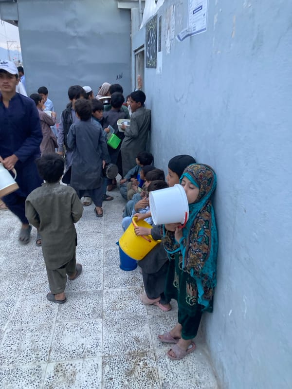 Daily life documented in Quetta includes food distribution