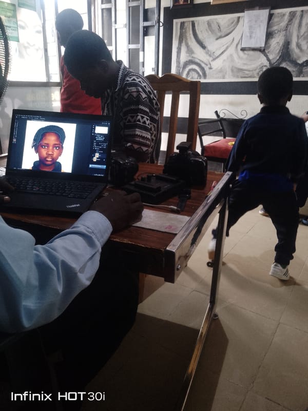 Laid-back afternoon indoors, kids around, laptops open