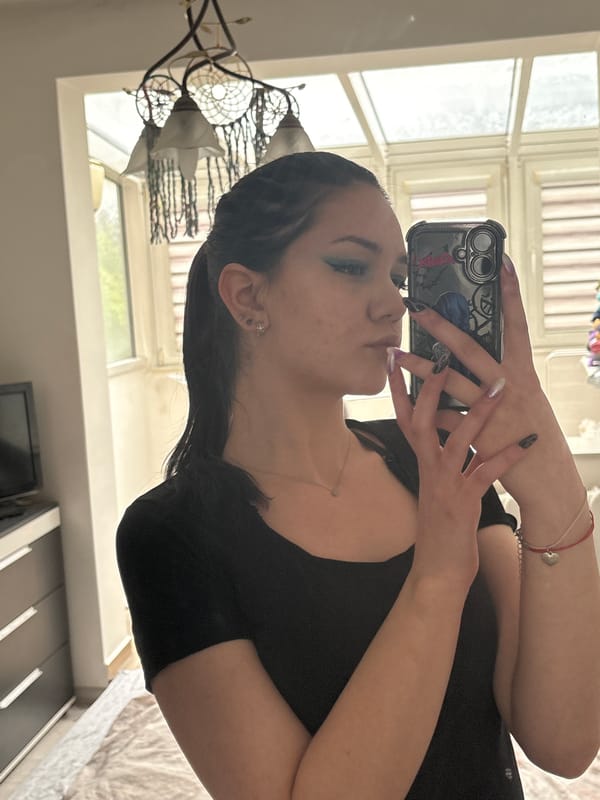 Woman takes indoor selfies in Sofia apartment