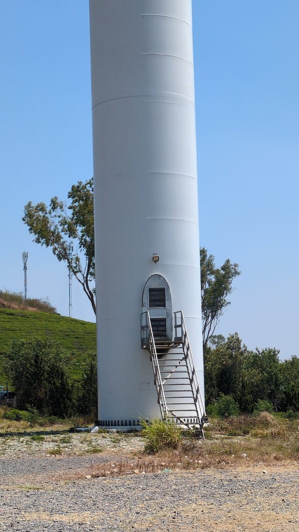 Wind turbine and excavator spotted in rural Vietnam