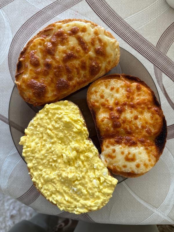 Simple bread breakfast with cheese and egg spread in Bulgaria
