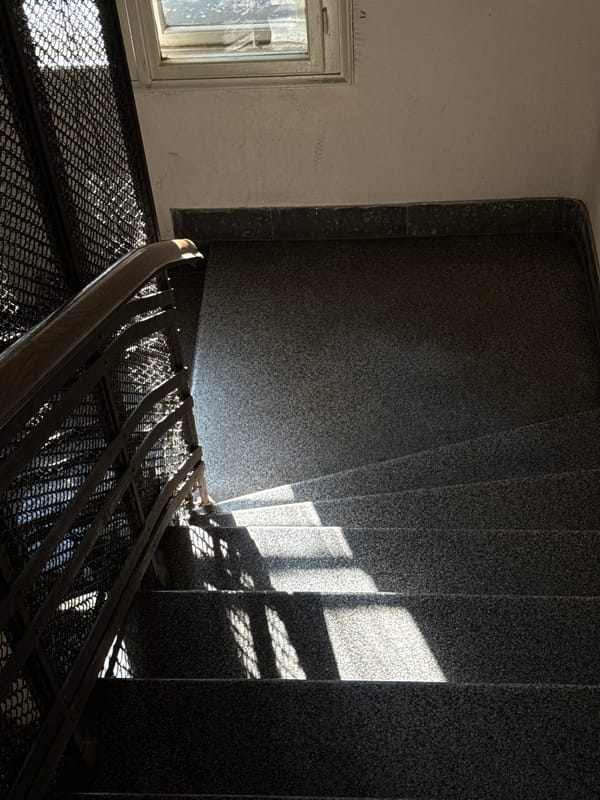 Morning sunlight illuminates old Belgrade building stairwell