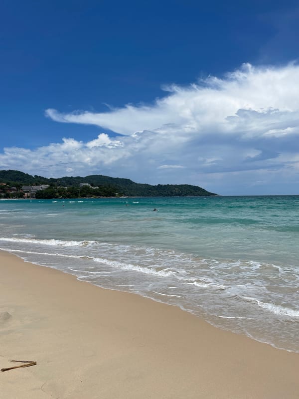 Morning beach activity with jet skiers at Karon, Thailand