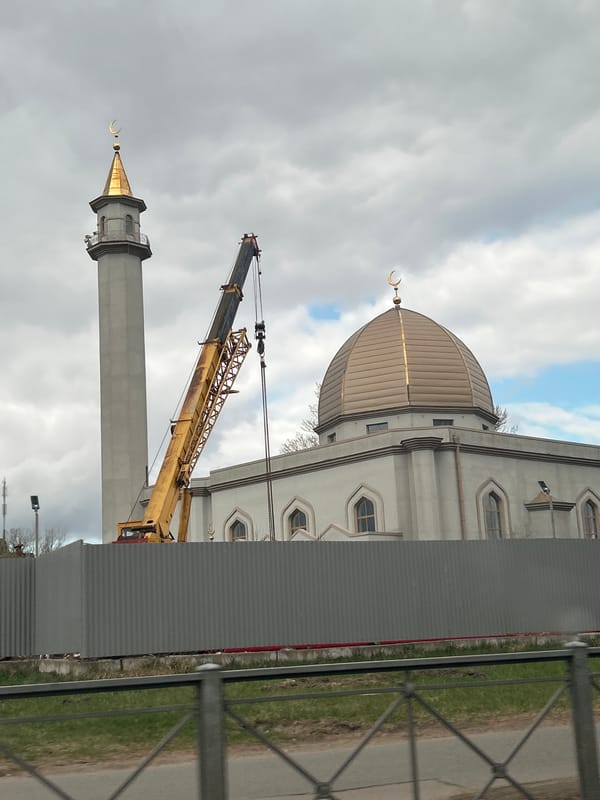 Mosque with golden crescents photographed in Saint Petersburg