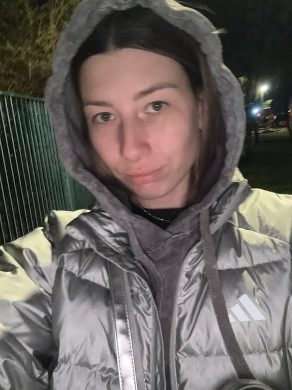 Nighttime walk documented in wet Moscow residential area