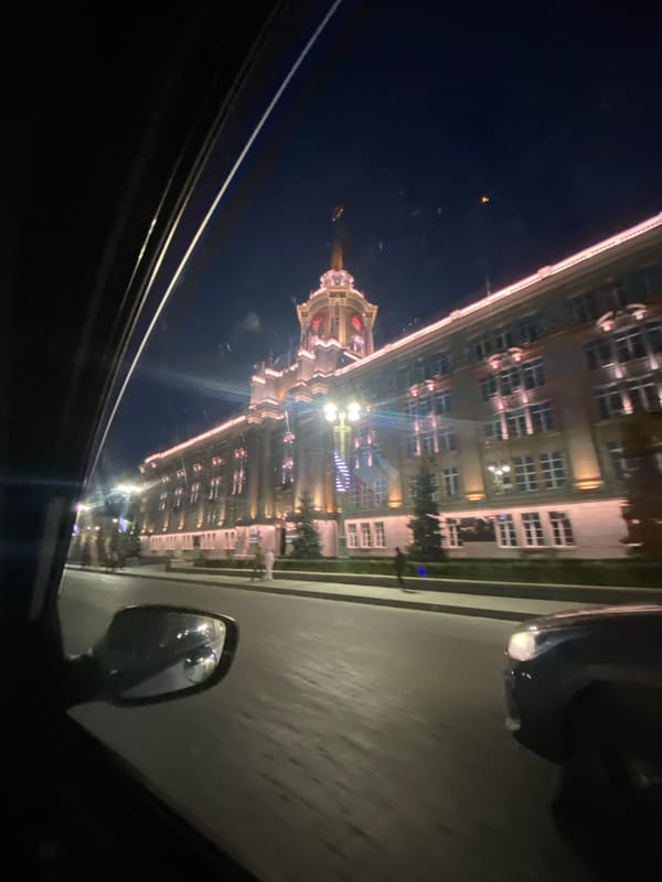 Illuminated civic building observed at night in Yekaterinburg