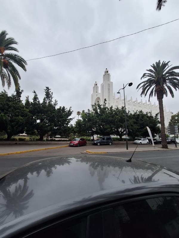 Inside and outside a modern Casablanca building, midday