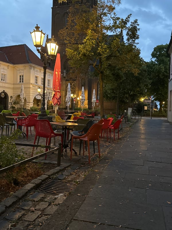 Krefeld's Neumarkt at dusk, St. Dionysius and quiet streets