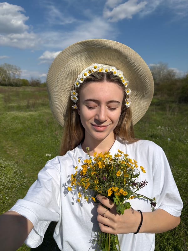 Couple enjoys spring flower field outing in Bulgarian countryside