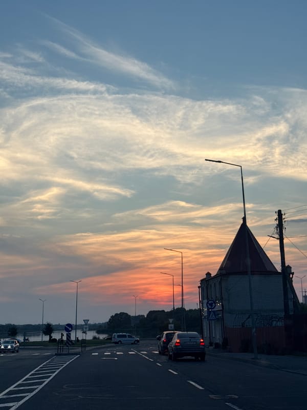 Sunset skies over road and water in Vinnytsia