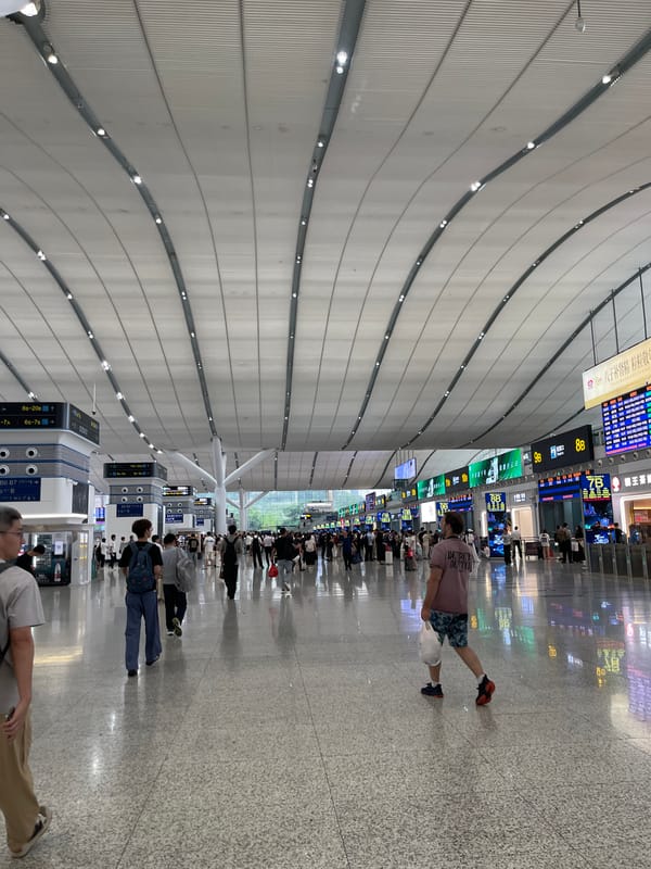 Morning rush inside a major Longhua transit hub