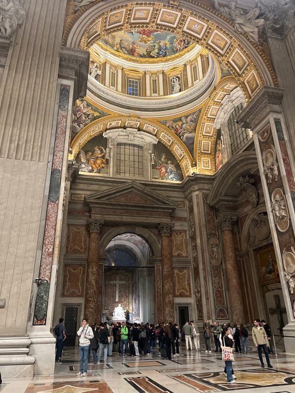 Tourist documents Vatican's St. Peter's Basilica during evening visit