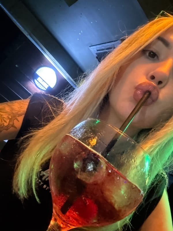 Two women enjoy evening drinks at Ruse nightclub