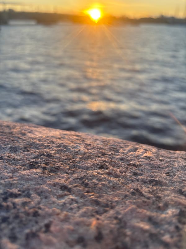 Sunset documented across Saint Petersburg landmarks and waterways