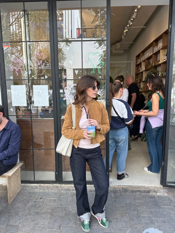 Everyday street life documented across Tel-Aviv commercial district