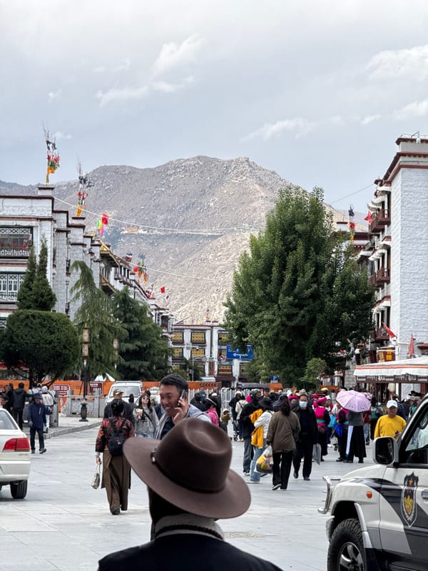 Morning crowds gather near Jokhang Temple, Potala Palace in Lhasa