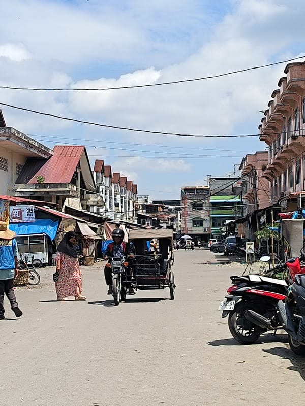 Morning street life documented in Lhokseumawe, Indonesia
