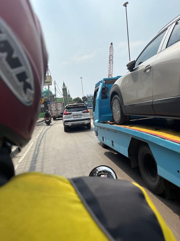 Morning motorcycle commute documented through North Jakarta streets