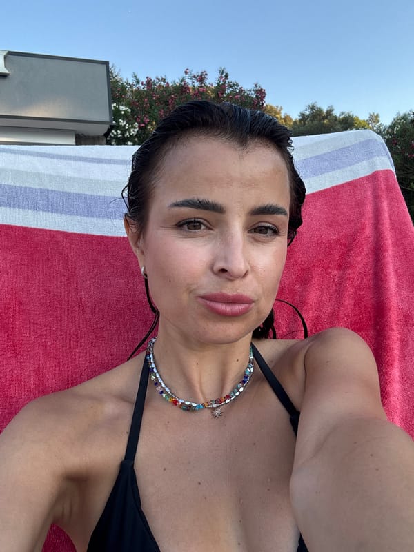 Afternoon selfies at a relaxed outdoor spot with a beaded necklace