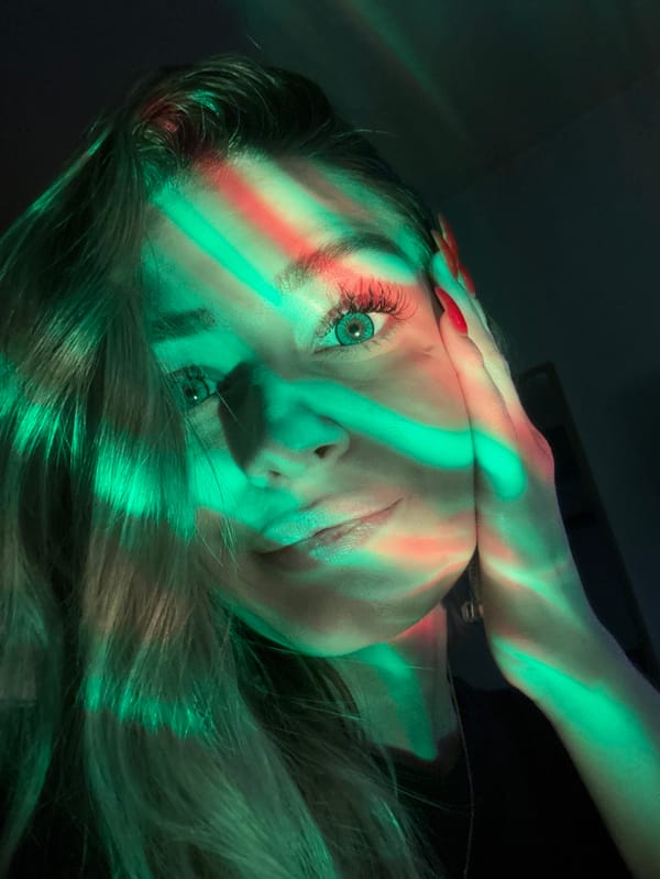 Woman documents evening routine with atmospheric lighting in Reutov
