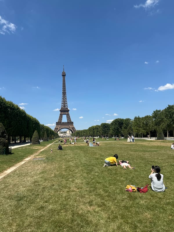Sunny morning at the Champ de Mars, Eiffel Tower in full view