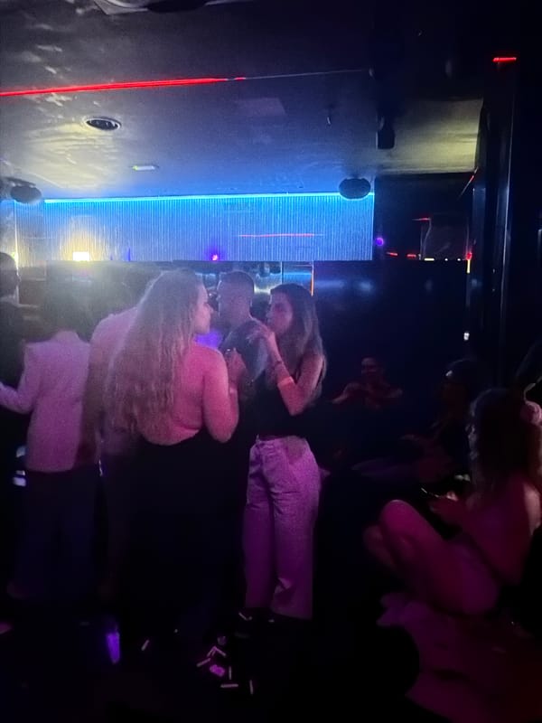Late night social gathering at Milan entertainment venue