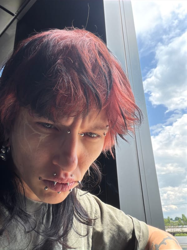 Person with piercings photographed smoking in Sofia Bulgaria