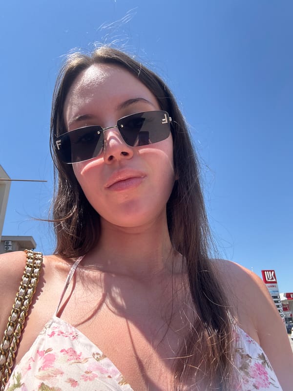 Floral dress, Fendi shades, selfies across elevators and sunny spots