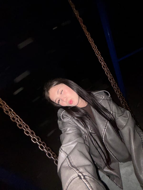 Woman photographs evening visit to playground in Фоки, Russia