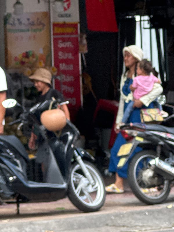 Street life, food, and transport across a Nha Trang morning
