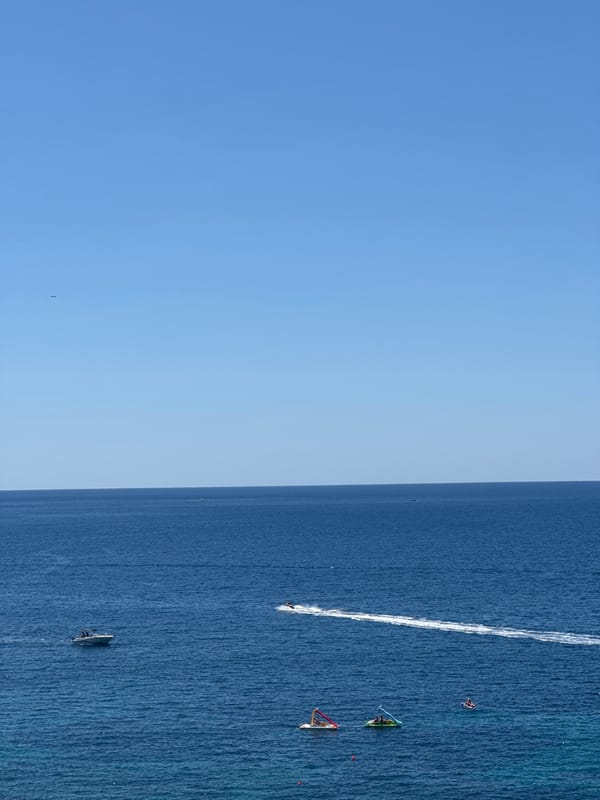 Kamenovo beach in full summer swing, crowds and coastal traffic