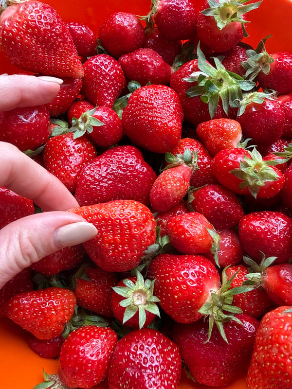 Food preparation with strawberries and cream in Zelenika
