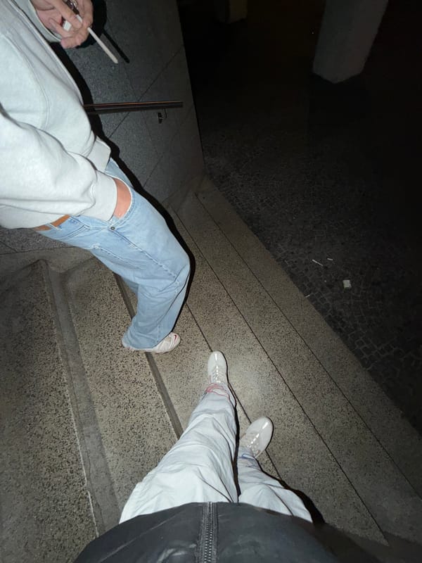 Two men photographed on stairs in Vila Real underpass