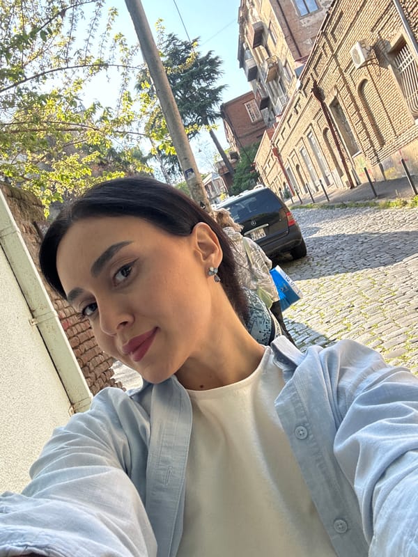 Tourist documents selfies and street musician in Tbilisi
