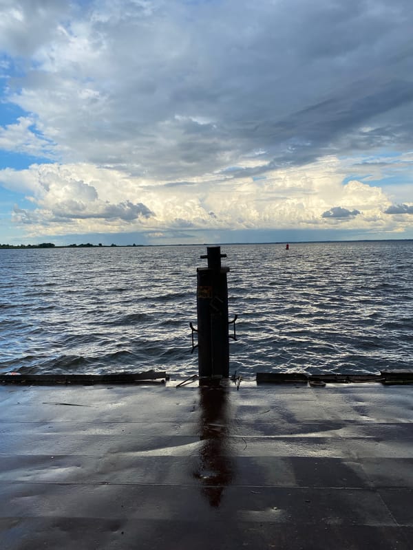 Out on the water from a wet pier deck