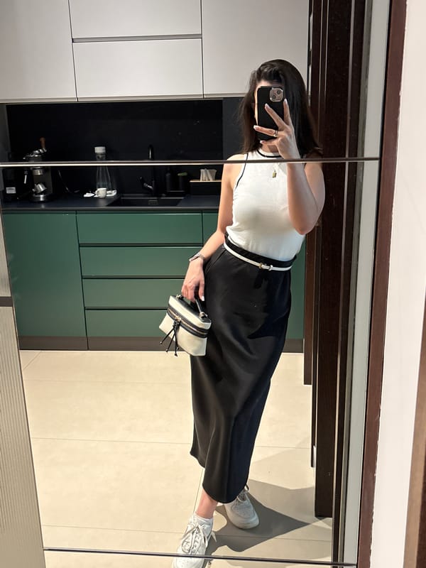Woman takes mirror selfie in Sofia kitchen