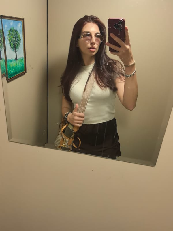 Woman takes mirror selfie in Stara Zagora, Bulgaria