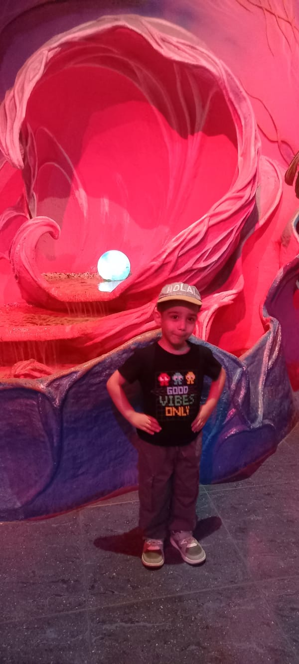 Boy visits aquarium at Krasnodar shopping mall morning outing