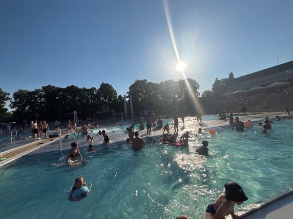 Crowded outdoor pool on a sunny afternoon, multiple angles