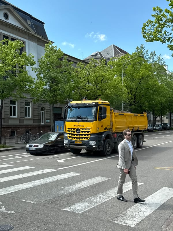 Man in suit spotted on sunny Strasbourg street