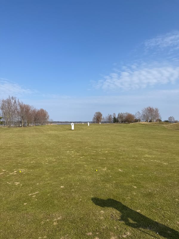 Golf practice session captured at Riga driving range