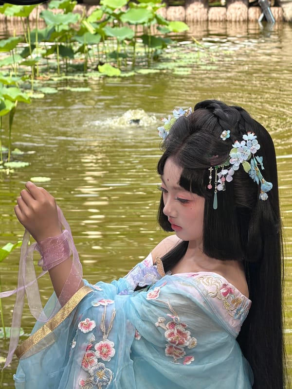Woman documented in multiple outfit changes during Chongqing photo session