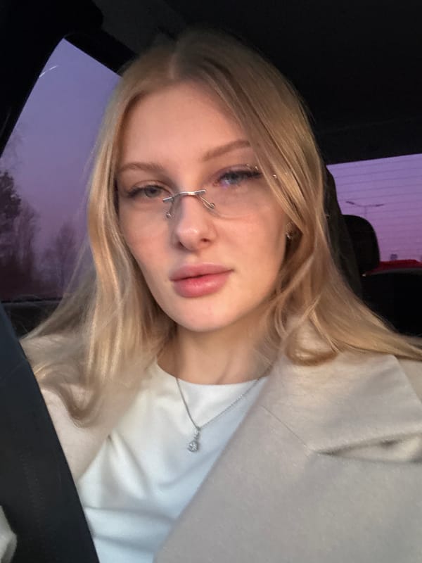 Woman with unique nose piercing photographed in car, Perm