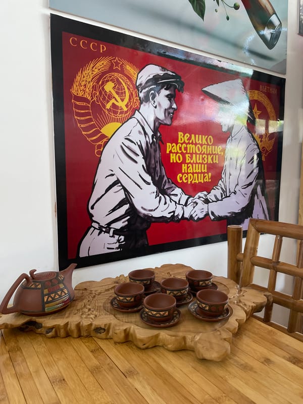 Morning scenes captured at Vietnam location with historical poster