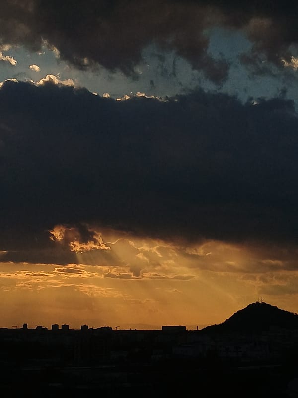 Dramatic sunset with storm clouds captured over Plovdiv, Bulgaria