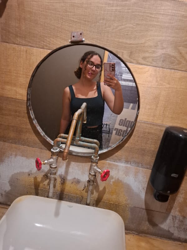 Woman documents evening out with restroom selfies and nighttime city scenes