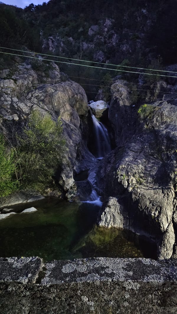 Waterfall flows through rocky gorge near Karlovo, Bulgaria