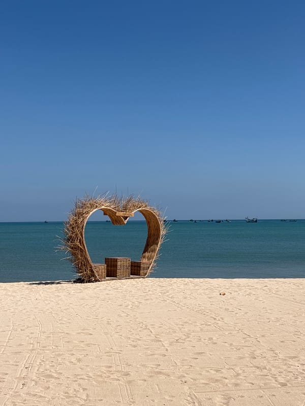 Kuta Beach and its Balinese stone gateway, up close