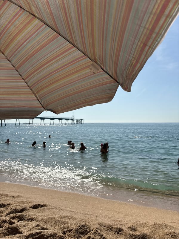 Laid-back beach day with water sports and shoreline details