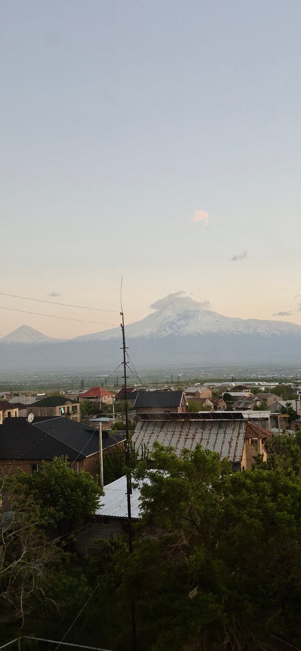 Casual afternoon documentation captures Yerevan cityscape and spirits
